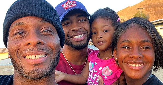 Image of Kel Mitchell with his three children