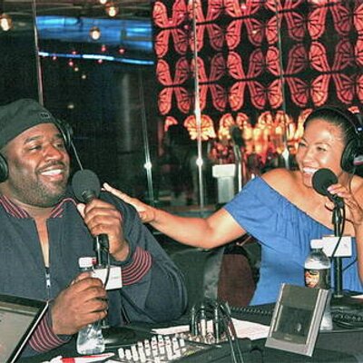 Image of comedian, Corey Holcomb with his wife, Maya Holcomb